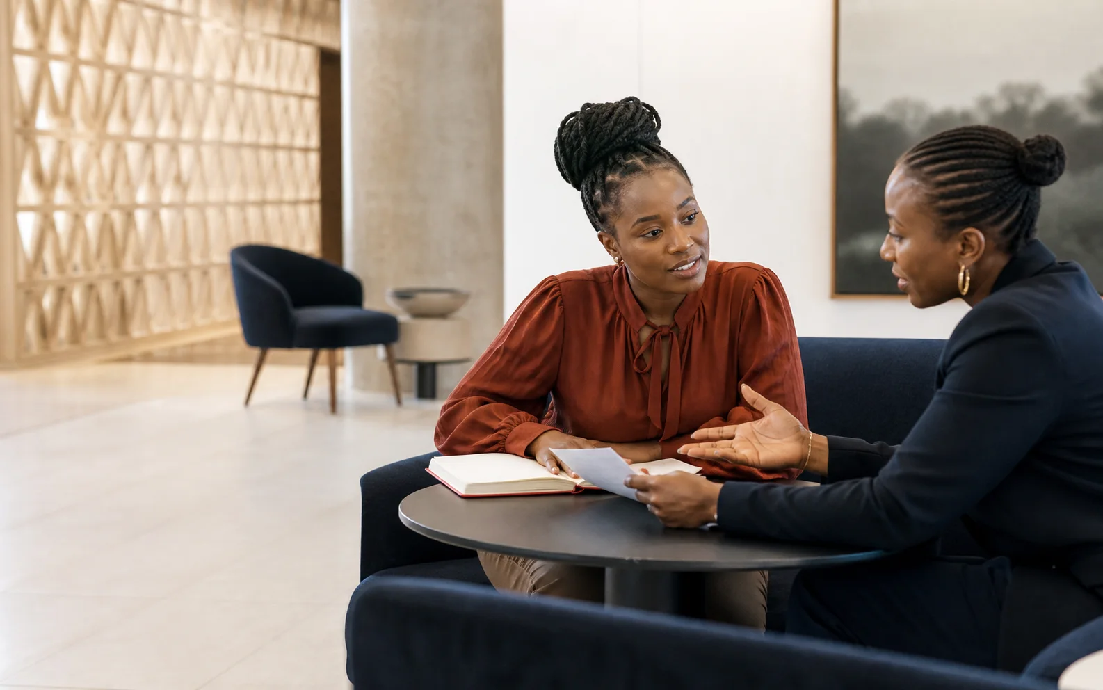 A business-support consultation between an advisor and entrepreneur